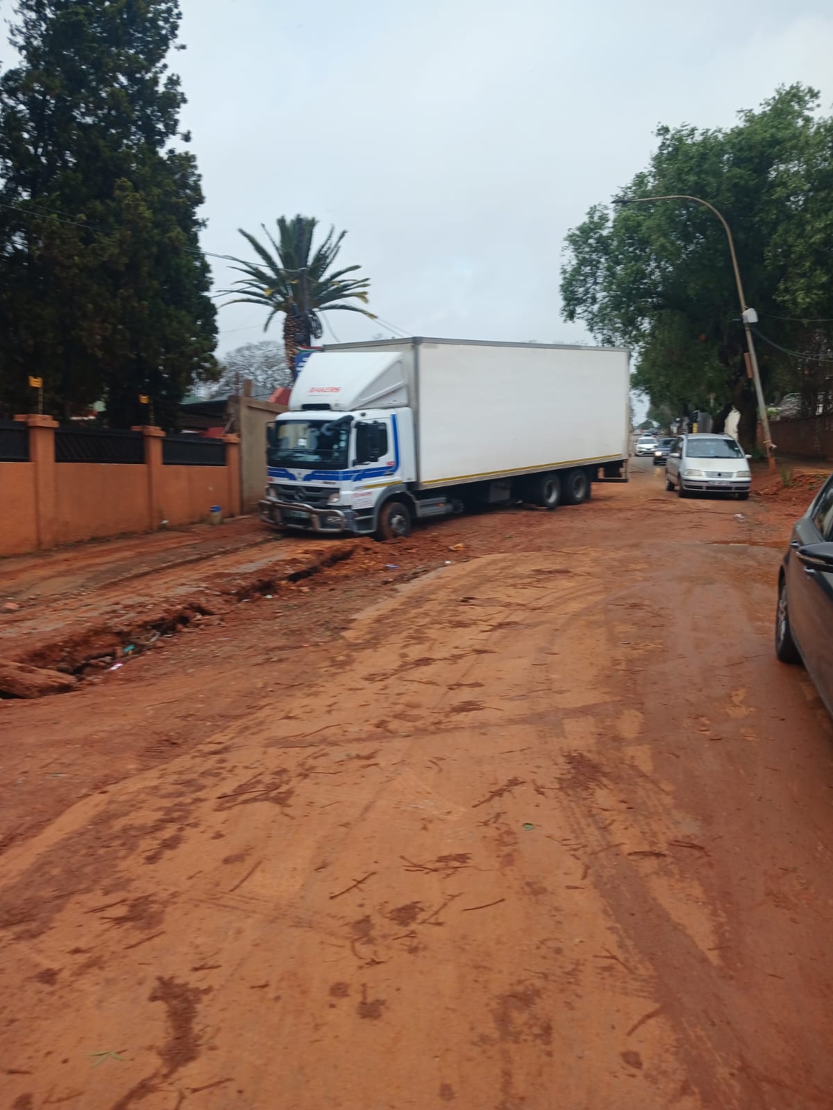 a truck in a pot hole